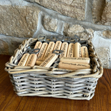 a wicker basket filled with lots of baseball bats