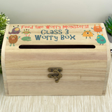 a wooden box with a picture of monsters on it