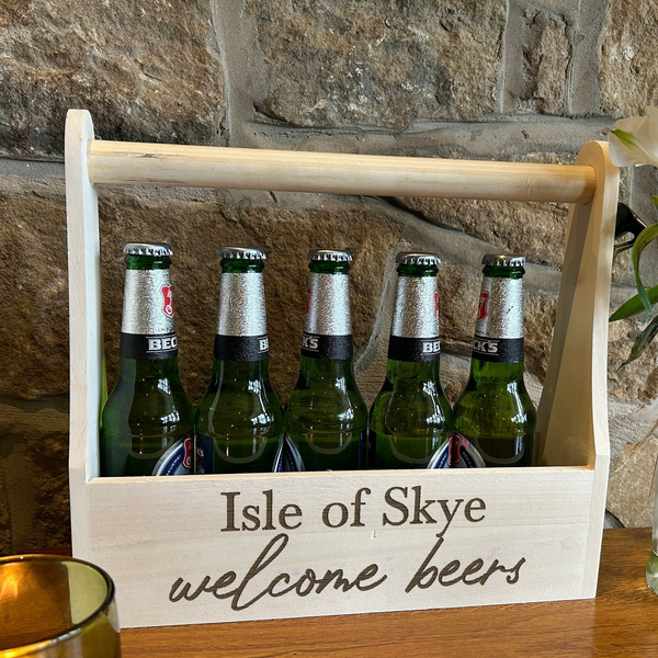 six bottles of beer in a wooden crate